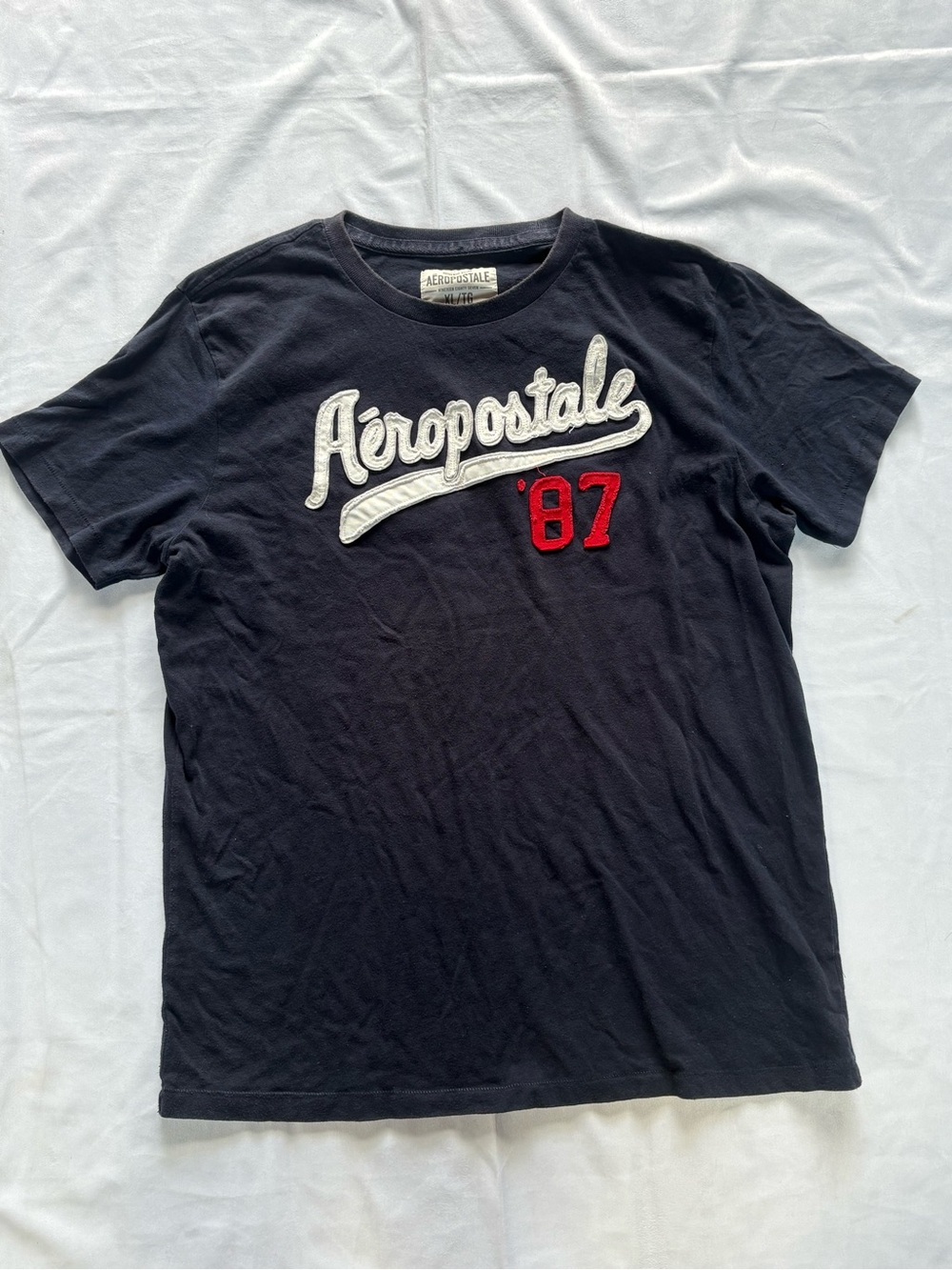 Y2K 2000s style Embroidered Distressed Graphic Tee | $20
